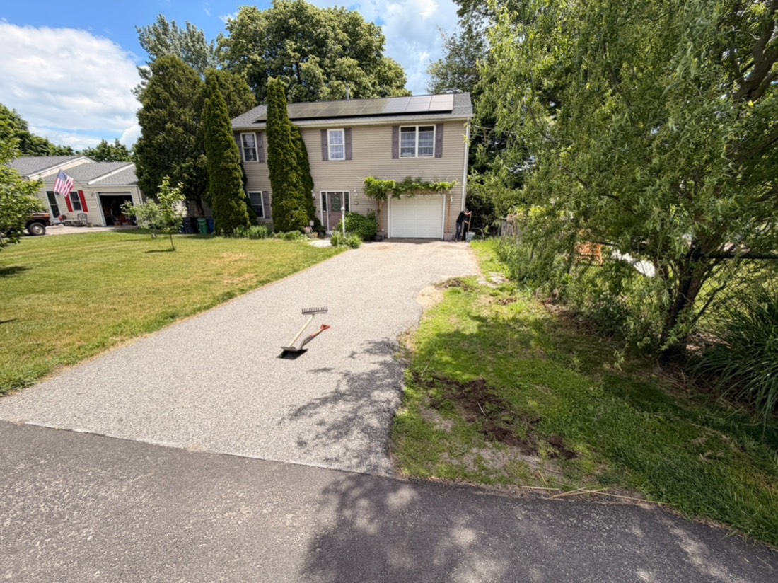 Worn driveway before work begins
